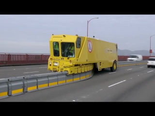 the car moves the separation barrier on the road