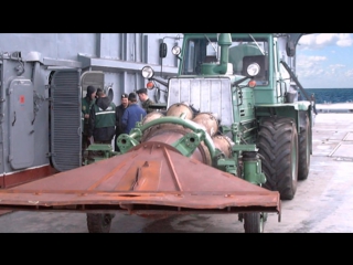 tractor with a mig-15 engine on the deck of the admiral kuznetsov