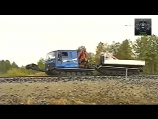 two-link caterpillar all-terrain vehicle with the ability to move along the railway track